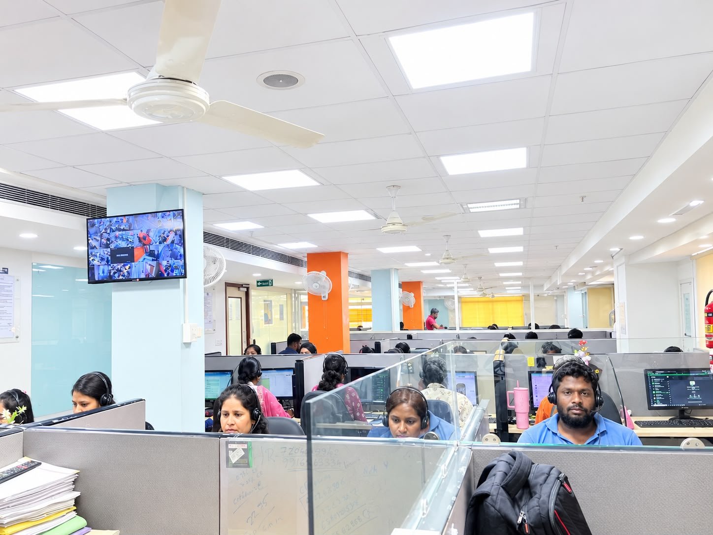 Falcon customer-support team attending calls at the Bangalore office